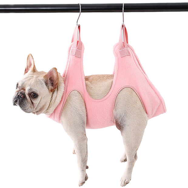 Soft plush pet hammock for grooming assistance.